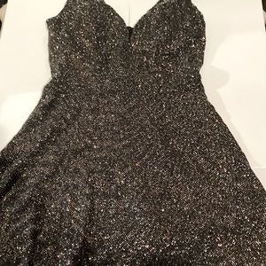 Cute black dress with glittery design